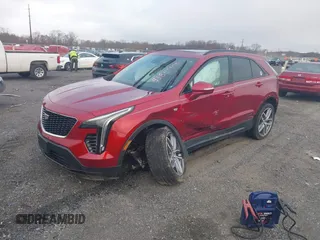 2021 Cadillac XT4 AWD Sport with VIN 1GYFZFR43MF006039, listed as a IAAI auction lot 41845105 with 19,289 mi miles and . Bid and sale history available at DreamBid. Image 17.