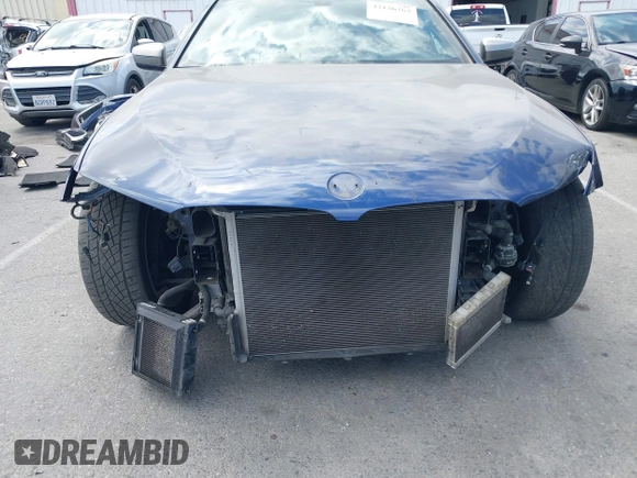 2018 BMW 5 Series M550i xDrive with VIN WBAJB9C59JB049436, listed as a IAAI auction lot 42126762 with 126,684 mi miles and . Bid and sale history available at DreamBid. Image 6.