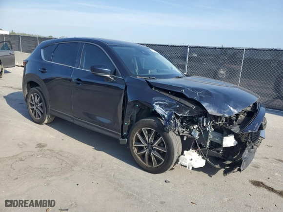 2018 Mazda CX-5 Touring with VIN JM3KFACM0J1409047, listed as a Copart auction lot 51233635 with NaN miles and Non Repairable. Bid and sale history available at carsss.com. Image 4.