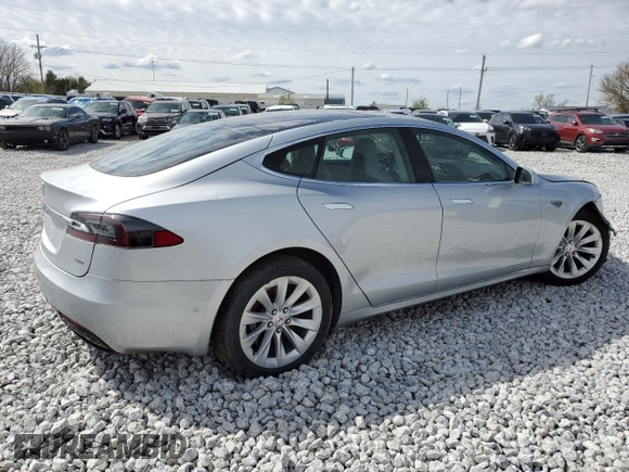 2016 Tesla Model S 90D with VIN 5YJSA1E25GF142104, listed as a Copart auction lot 50874815 with 84,917 mi miles and Salvage Title. Bid and sale history available at DreamBid. Image 3.