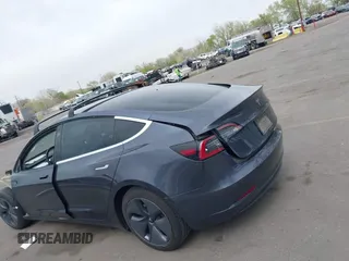 2020 Tesla Model 3 Long Range with VIN 5YJ3E1EB1LF639055, listed as a IAAI auction lot 42048009 with 43,493 mi miles. Bid and sale history available at carsss.com. Image 14.