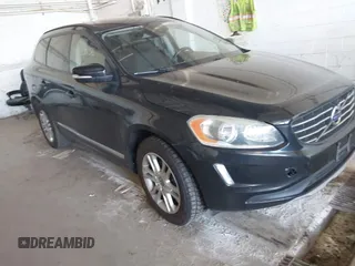 2016 Volvo XC60 T5 Drive-E z VIN YV440MDJ9G2872118, wystawiony jako IAAI lot #42374756 z przebiegiem 159 520 mil mil oraz . Historia ofert i sprzedaży dostępna na DreamBid. Obrazek 1.