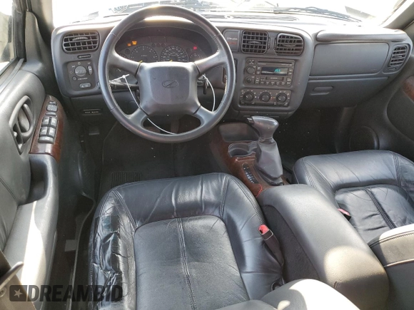 2000 Oldsmobile Bravada z VIN 1GHDT13W7Y2351268, wystawiony jako Copart lot #66408824 z przebiegiem 134 512 mil mil oraz Tytuł czysty. Historia ofert i sprzedaży dostępna na DreamBid. Obrazek 8.