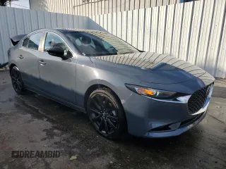 2025 Mazda 3 S Carbon Edition with VIN 3MZBPBCM5SM456474, listed as a Copart auction lot 43121065 with 3,616 mi miles and Clean Title. Bid and sale history available at DreamBid. Image 4.