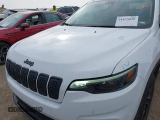 2023 Jeep Cherokee Altitude Lux with VIN 1C4PJMMB6PD112545, listed as a IAAI auction lot 41875820 with 53,559 mi miles. Bid and sale history available at carsss.com. Image 6.
