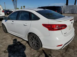 2016 Ford Focus SE with VIN 1FADP3F26GL336032, listed as a Copart auction lot 48334005 with 107,527 mi miles and Clean title. Bid and sale history available at DreamBid. Image 2.