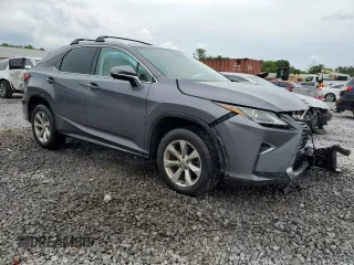 2016 Lexus RX 350 with VIN 2T2ZZMCA5GC022564, listed as a Copart auction lot 56579535 with 123,459 mi miles and Salvage title. Bid and sale history available at DreamBid. Image 4.