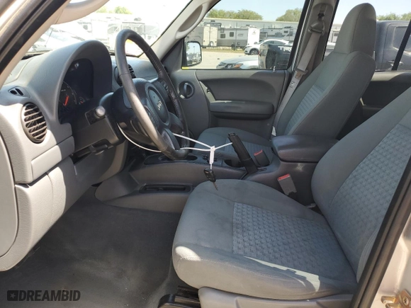 2005 Jeep Liberty Sport with VIN 1J4GK48K95W682154, listed as a Copart auction lot 52176155 with 164,743 mi miles and Salvage Title. Bid and sale history available at carsss.com. Image 7.