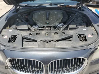 2011 BMW 7 Series 750i with VIN WBAKA8C59BCY36657, listed as a Copart auction lot 61484925 with 174,605 mi miles and Salvage title. Bid and sale history available at DreamBid. Image 11.