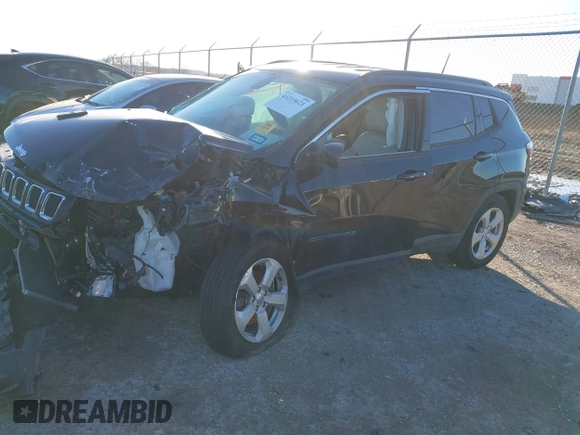 2019 Jeep Compass Latitude with VIN 3C4NJCBB1KT851846, listed as a IAAI auction lot 41219621 with 56,626 mi miles and . Bid and sale history available at DreamBid. Image 2.