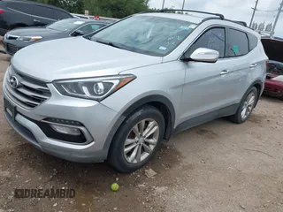 2018 Hyundai Santa Fe 2.0T z VIN 5XYZU4LA9JG537310, wystawiony jako IAAI lot #42393689 z przebiegiem Nie podano mil oraz . Historia ofert i sprzedaży dostępna na DreamBid. Obrazek 17.