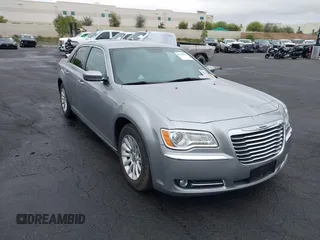 2014 Chrysler 300 with VIN 2C3CCAAG7EH249196, listed as a IAAI auction lot 42180023 with 48,241 mi miles and . Bid and sale history available at DreamBid. Image 1.