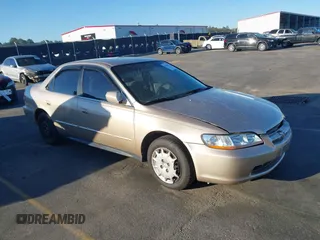 2001 Honda Accord LX z VIN 1HGCG56401A054167, wystawiony jako IAAI lot #41838672 z przebiegiem 241 091 mil mil oraz . Historia ofert i sprzedaży dostępna na DreamBid. Obrazek 1.