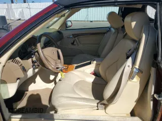 1999 Mercedes-Benz SL-Class with VIN WDBFA68F3XF184908, listed as a Copart auction lot 77165784 with 67,408 mi miles and Salvage Title. Bid and sale history available at carsss.com. Image 7.