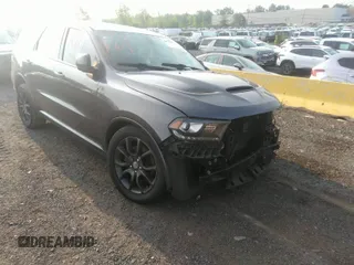 2015 Dodge Durango R/T with VIN 1C4SDJCT2FC240358, listed as a IAAI auction lot 39977667 with 91,182 mi miles and . Bid and sale history available at carsss.com. Image 1.