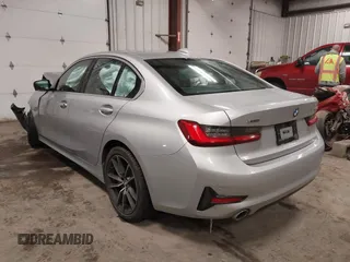 2019 BMW 3 Series 330i xDrive with VIN WBA5R7C53KAJ86493, listed as a IAAI auction lot 41559974 with 55,391 mi miles. Bid and sale history available at carsss.com. Image 3.