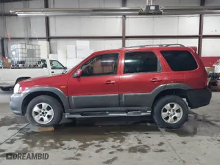 2005 Mazda Tribute s with VIN 4F2CZ96185KM00617, listed as a IAAI auction lot 41520649 with 182,334 mi miles. Bid and sale history available at carsss.com. Image 14.