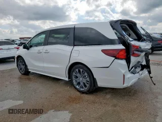 2025 Honda Odyssey Touring with VIN 5FNRL6H88SB001428, listed as a Copart auction lot 53836615 with 14,580 mi miles and Salvage title. Bid and sale history available at DreamBid. Image 2.