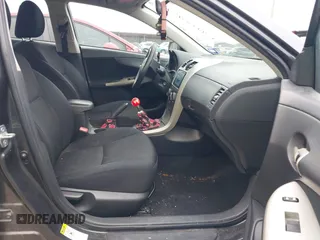 2011 Toyota Corolla L with VIN 2T1BU4EE6BC694212, listed as a IAAI auction lot 42130957 with 152,365 mi miles. Bid and sale history available at carsss.com. Image 5.