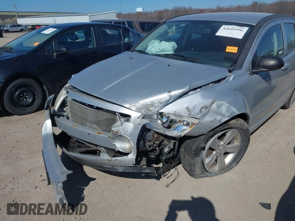 2011 Dodge Caliber Mainstreet with VIN 1B3CB3HA9BD295750, listed as a IAAI auction lot 42049996 with Not Provided miles. Bid and sale history available at carsss.com. Image 6.