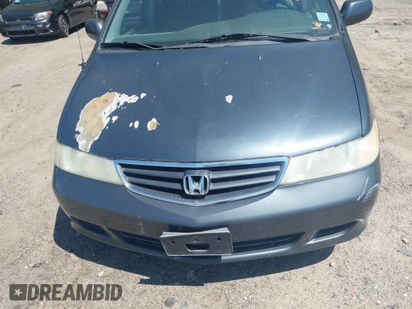 2003 Honda Odyssey EX with VIN 5FNRL18683B132703, listed as a IAAI auction lot 42004982 with Not Provided miles and . Bid and sale history available at DreamBid. Image 6.