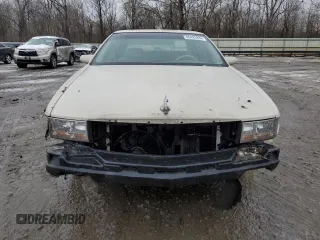 1995 Cadillac DeVille z VIN 1G6KD52B8SU274053, wystawiony jako Copart lot #86429934 z przebiegiem 100 496 mil mil oraz Szkoda całkowita • Salvage title. Historia ofert i sprzedaży dostępna na DreamBid. Obrazek 5.
