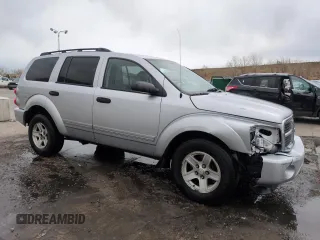 2004 Dodge Durango SLT with VIN 1D4HB48N74F159656, listed as a Copart auction lot 51128785 with 140,854 mi miles and Salvage title. Bid and sale history available at DreamBid. Image 4.