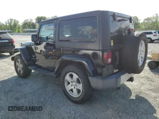 2012 Jeep Wrangler Sahara z VIN 1C4AJWBG6CL236704, wystawiony jako Copart lot #55099555 z przebiegiem 102 180 mil mil oraz Szkoda całkowita • Salvage title. Historia ofert i sprzedaży dostępna na DreamBid. Obrazek 2.