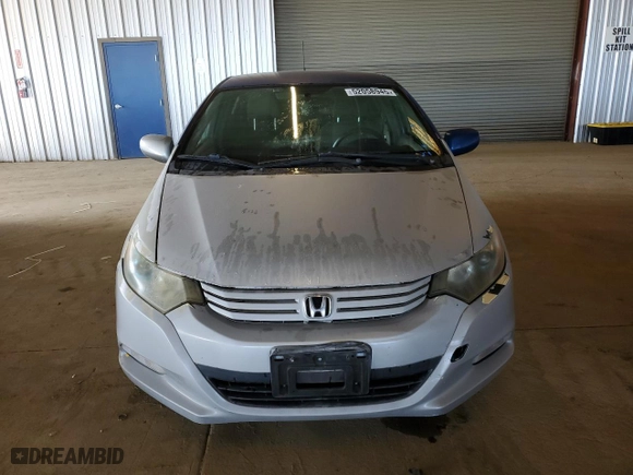 2010 Honda Insight LX with VIN JHMZE2H56AS020214, listed as a Copart auction lot 52058945 with 344,905 mi miles and Clean Title. Bid and sale history available at carsss.com. Image 5.