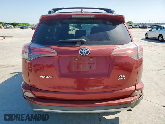 2018 Toyota RAV4 XLE with VIN JTMRFREV4JD234778, listed as a Copart auction lot 52715065 with 131,407 mi miles and Salvage Title. Bid and sale history available at carsss.com. Image 6.