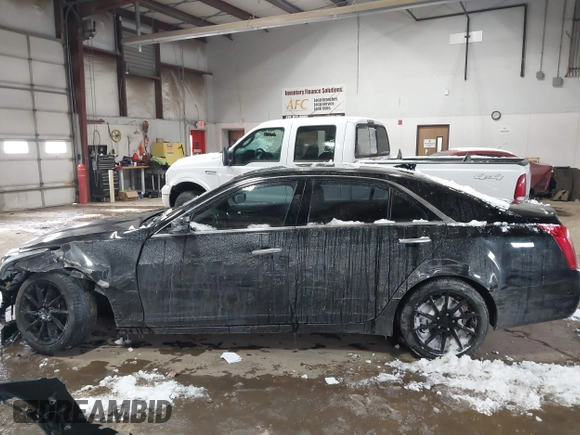 2016 Cadillac CTS Luxury Collection AWD with VIN 1G6AX5SX6G0111768, listed as a IAAI auction lot 41563991 with 76,718 mi miles and . Bid and sale history available at DreamBid. Image 14.