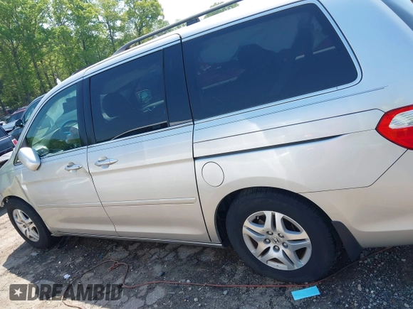 2007 Honda Odyssey EX-L z VIN 5FNRL38667B453060, wystawiony jako IAAI lot #42066637 z przebiegiem 184 439 mil mil oraz . Historia ofert i sprzedaży dostępna na DreamBid. Obrazek 14.