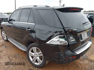 2015 Mercedes-Benz M 350 with VIN 4JGDA5JB4FA544530, listed as a IAAI auction lot 41558572 with 200,973 mi miles and . Bid and sale history available at DreamBid. Image 3.