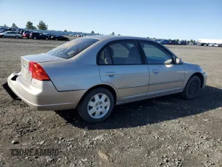 2002 Honda Civic EX with VIN 1HGES25712L014218, listed as a Copart auction lot 52325265 with 206,919 mi miles and Salvage Title. Bid and sale history available at DreamBid. Image 3.