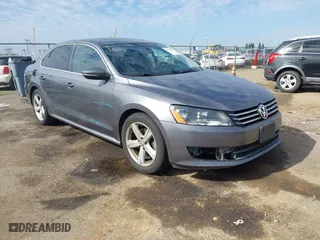 2012 Volkswagen Passat SE with VIN 1VWBP7A35CC024137, listed as a IAAI auction lot 41572782 with 138,827 mi miles. Bid and sale history available at carsss.com. Image 1.