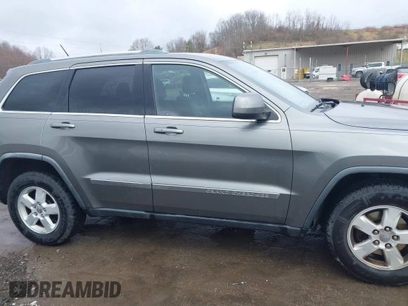 2012 Jeep Grand Cherokee Laredo with VIN 1C4RJFAGXCC118823, listed as a IAAI auction lot 41808398 with 153,509 mi miles. Bid and sale history available at carsss.com. Image 13.
