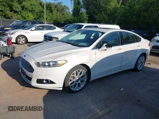2014 Ford Fusion Titanium with VIN 3FA6P0K95ER128961, listed as a IAAI auction lot 42750668 with 197,188 mi miles and . Bid and sale history available at DreamBid. Image 2.