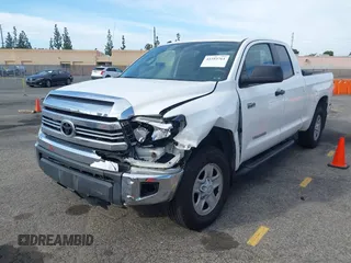 2017 Toyota Tundra SR z VIN 5TFUY5F12HX677173, wystawiony jako IAAI lot #41593761 z przebiegiem 186 206 mil mil oraz . Historia ofert i sprzedaży dostępna na DreamBid. Obrazek 19.
