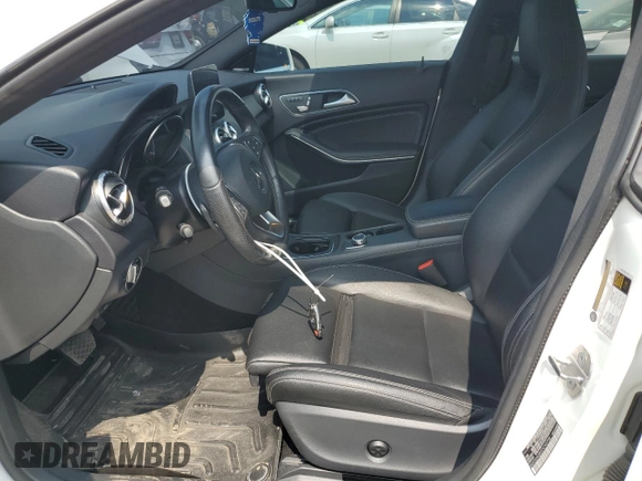 2019 Mercedes-Benz CLA 250 with VIN WDDSJ4GBXKN740798, listed as a Copart auction lot 59874665 with 60,164 mi miles and Salvage title. Bid and sale history available at DreamBid. Image 7.