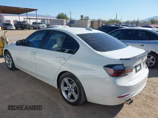 2014 BMW 3 Series 328i xDrive with VIN WBA3B3C56EJ981496, listed as a IAAI auction lot 41822862 with 137,700 mi miles. Bid and sale history available at carsss.com. Image 3.