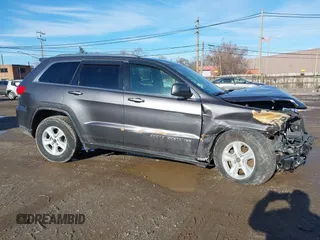 2017 Jeep Grand Cherokee Laredo with VIN 1C4RJFAG5HC836402, listed as a IAAI auction lot 41209574 with 58,875 mi miles. Bid and sale history available at carsss.com. Image 13.