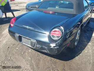 2002 Ford Thunderbird w/Hardtop Premium with VIN 1FAHP60AX2Y116200, listed as a IAAI auction lot 40129557 with 88,991 mi miles. Bid and sale history available at carsss.com. Image 17.