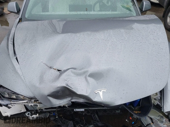 2025 Tesla Model 3 Long Range with VIN 5YJ3E1EA2SF885408, listed as a IAAI auction lot 41778498 with 1,566 mi miles and . Bid and sale history available at DreamBid. Image 20.