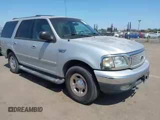 1999 Ford Expedition XLT z VIN 1FMPU18L9XLA91801, wystawiony jako IAAI lot #42486793 z przebiegiem 140 536 mil mil oraz . Historia ofert i sprzedaży dostępna na DreamBid. Obrazek 1.