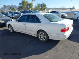 2002 Mercedes-Benz E-Class with VIN WDBJF65J22B455901, listed as a IAAI auction lot 41679008 with 153,854 mi miles. Bid and sale history available at carsss.com. Image 3.