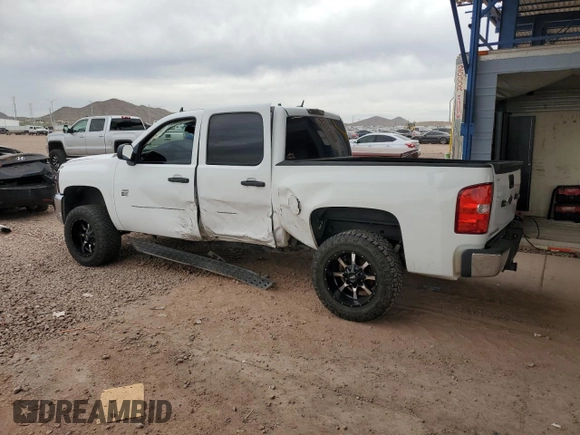2012 Chevrolet Silverado 1500 LT with VIN 3GCPKSE71CG189543, listed as a Copart auction lot 51070745 with 299,311 mi miles and Salvage Title. Bid and sale history available at DreamBid. Image 2.