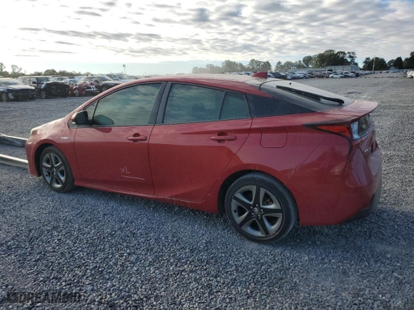 2021 Toyota Prius L Eco with VIN JTDKAMFU2M3127974, listed as a Copart auction lot 76284914 with 25,571 mi miles and Salvage Title. Bid and sale history available at carsss.com. Image 2.