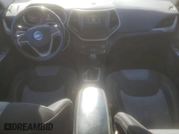 2014 Jeep Cherokee Sport with VIN 1C4PJLAB7EW279562, listed as a Copart auction lot 85054634 with 134,516 mi miles and Salvage Title. Bid and sale history available at DreamBid. Image 8.