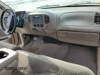 2000 Ford F-150 XL with VIN 2FTRX17W0YCA73568, listed as a Copart auction lot 51128035 with 208,737 mi miles and Salvage Title. Bid and sale history available at carsss.com. Image 8.
