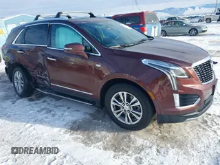 2022 Cadillac XT5 AWD Premium Luxury with VIN 1GYKNDRS9NZ128658, listed as a IAAI auction lot 41330193 with 34,361 mi miles and . Bid and sale history available at DreamBid. Image 1.